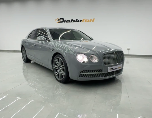 Bentley car's appearance after receiving car detailing and wrapping services in Dubai at Diablofoil